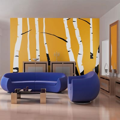 Fotobehang - Birches on the orange background.