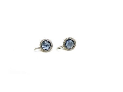 model Carlotta oorringen in zilver gezet met blauwe steen en cubic zirconia