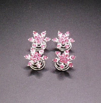 Curlies donkerroze bloem 6 blad punt met strass