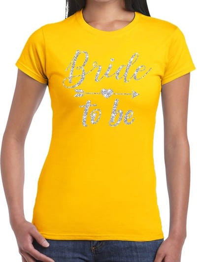 Bride to be Cupido zilver glitter tekst t-shirt geel dames - dames shirt Bride to be- Vrijgezellenfeest kleding XS