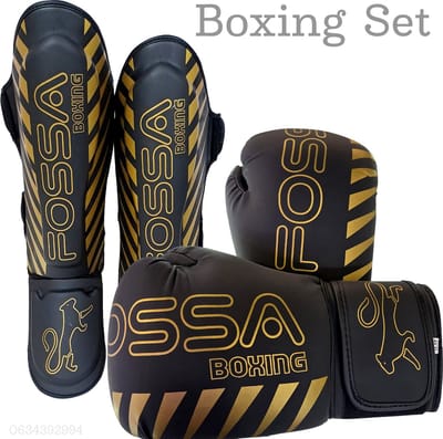 Boxing Gloves + Shin Guards Set Premium Boxing Gloves 10oz / 12oz / 14oz – PU Leather – For Men & Women – Shin Guard S M L PU Leather For Men & Women Kickboxing, Muay Thai & Training – Black & Golden New Model