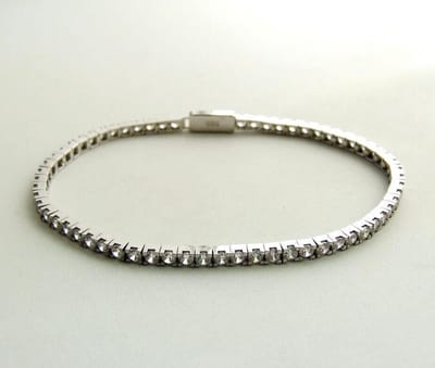 Wit gouden tennisarmband met zirkonia