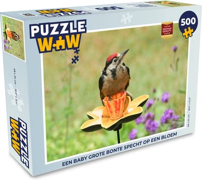 Puzzel Een baby grote bonte specht op een bloem - Legpuzzel - Puzzel 500 stukjes