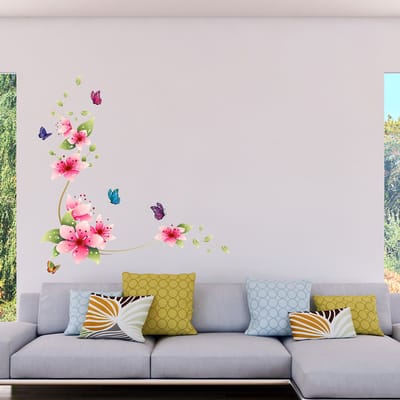 Decoratieve muurstickers met roze bloemen en vlinders