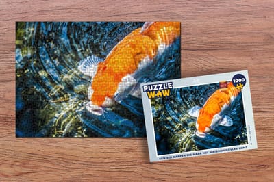 Puzzel Een koi karper die naar het wateroppervlak komt - Legpuzzel - Puzzel 1000 stukjes volwassenen