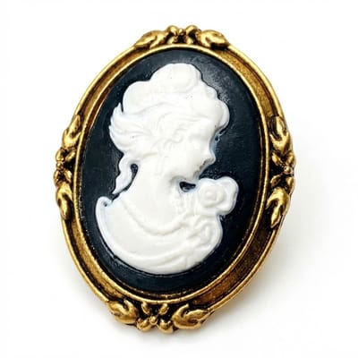 Zwart witte ovale camee broche met profiel – broche dames – decoratieve speld met klassieke cameo uitstraling, goudkleurige sierlijke rand en reliëf portret ontwerp