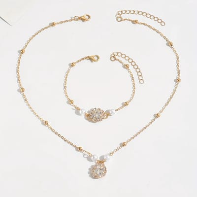 Sjika - Gouden Sieradenset Dames – Ketting & Armband met Parels en Zirkonia – Luxe Elegante Set – Gold Plated - Cadeau voor haar