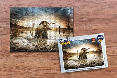 Puzzel Een hond voltooid zijn jacht met een eend in zijn bek - Legpuzzel - Puzzel 500 stukjes
