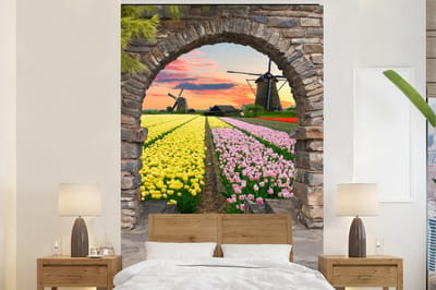Behang - Fotobehang Tulpen - Bloemen - Molen - Doorkijk - Breedte 225 cm x hoogte 350 cm