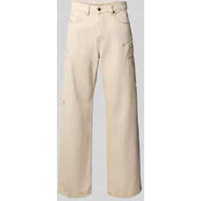 High waist baggy jeans met destroyed-details