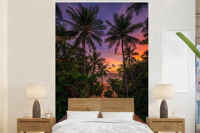 Behang - Fotobehang Zonsondergang - Palmbomen - Strand - Breedte 170 cm x hoogte 260 cm