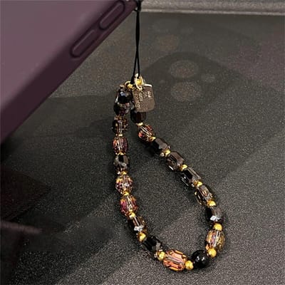 Chaîne de téléphone perles cristal noir or mignonne pour femme Mode Lanière de téléphone de luxe Corde de suspension au poignet Cadeaux -