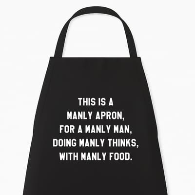Zwart Keukenschort "This Is A Manly Apron" | Stoer Cadeau voor Hem | Kerst & Sinterklaas