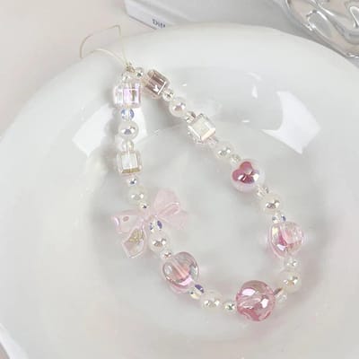 Pendentif en perles avec nœud papillon pour femmes, breloque en chaîne, étui de téléphone portable, Anti-perte, lanière, bijoux rose