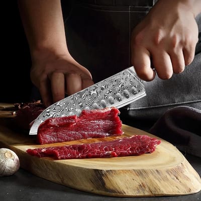 Professioneel 7 Inch Koksmes van Damasceens staal, scherp en duurzaam, met vingerbescherming en slijper, ideaal voor vlees en keukengebruik