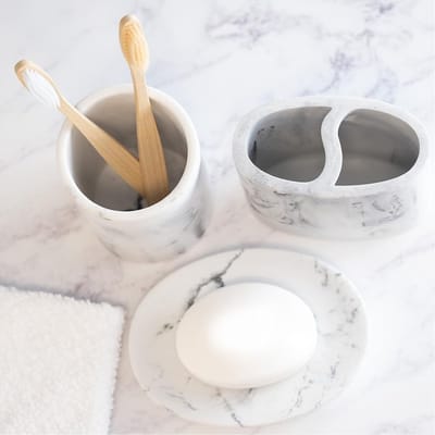 Dailygoods- Badkameraccessoireset 4-delig - Zeepdispenser - Tandenborstelhouder - Zeepbakje - Opbergcontainer - Luxe marmeren print - Badkameraccessoires