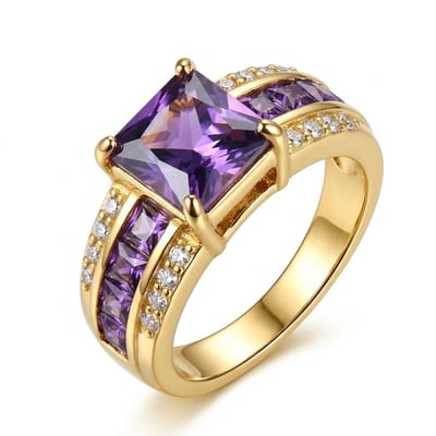 Paars goudkleurige ring dames maat 6 met steen vierkante paarse steen en pavé details brede band ring met paarse en transparante stenen statement ring