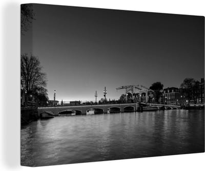 Canvas schilderij 140x90 cm - Wanddecoratie Magere brug over de Amstel - zwart wit - Muurdecoratie woonkamer - Slaapkamer decoratie - Kamer accessoires - Schilderijen