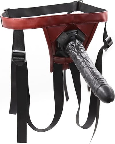 Nooitmeersaai - Leren strap-on harnas met zwarte dildo - 19 cm