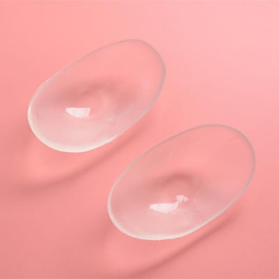 1 paire de coussinets d'épaule antidérapants en silicone naturellement doux, invisibles, rehausseurs d'épaules, coussins push-up, réutilisables, auto-adhésifs, unisexes Transparent pink