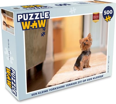 Puzzel Een kleine Yorkshire Terrier zit op een kleedje - Legpuzzel - Puzzel 500 stukjes