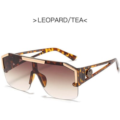 Lunettes de soleil tendance tête de lion Monture large Jambe creuse en plastique Pièce unique Lunettes élégantes pour femme gray