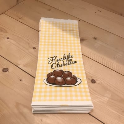 Oliebollenzakken "Heerlijke Oliebollen" Ersatz Papier 1500gr 50 stuks, zakken voor ca 20 oliebollen.