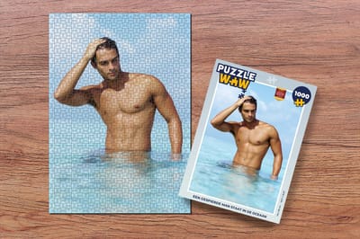 Puzzel Een gespierde man staat in de oceaan - Legpuzzel - Puzzel 1000 stukjes volwassenen