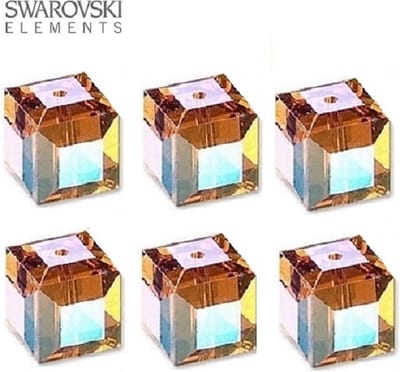 Swarovski kristal, kubus kralen van 10x10mm in de kleur Topaz AB. Per 6 stuks