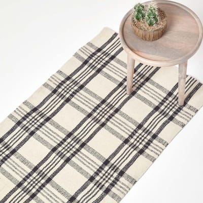 Homescapes Logan 100% wollen geruit antisliptapijt, zwart en wit, 66 x 200 cm
