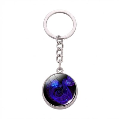 Zilverkleurige ronde sleutelhanger met blauwe waterman afbeelding – sleutelhanger voor dames en heren – metalen keychain met waterman sterrenbeeld symbool en schakel ketting