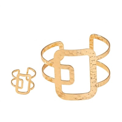 Goudkleurige opengewerkte bangle armband voor dames – moderne armband met bijpassende ring