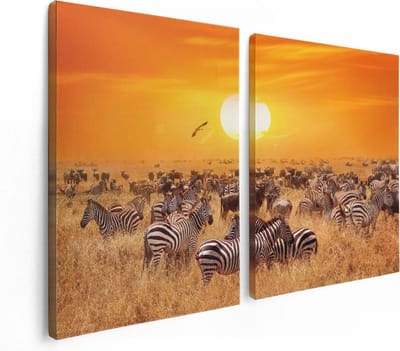 Artaza Canvas Schilderij Tweeluik Kudde Zebra's Bij Een Oranje Zonsondergang - 120x80 - Foto Op Canvas - Canvas Print