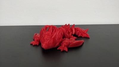 Articulated Rozen Wyvern fidget Rood