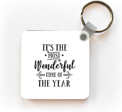 Sleutelhanger - Uitdeelcadeautjes - Kerst quote "It's the most wonderful time of the year" op een witte achtergrond - Plastic - Kerst - Cadeau - Kerstcadeau voor mannen en voor vrouwen
