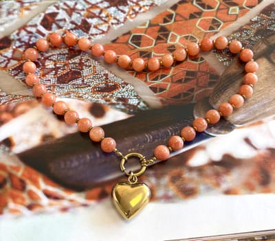 Ketting oranje chalcedoon kralen 10mm/hart goud