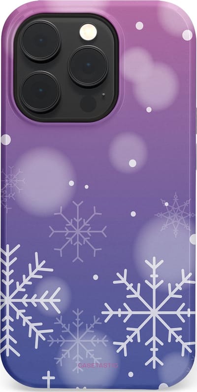 Casetastic hoesje geschikt voor Apple iPhone 14 Pro - MagSafe - Dubbellaagse bescherming - Winter Sneeuw Paarse Roze Gloed - Fashion Case - Lavendel