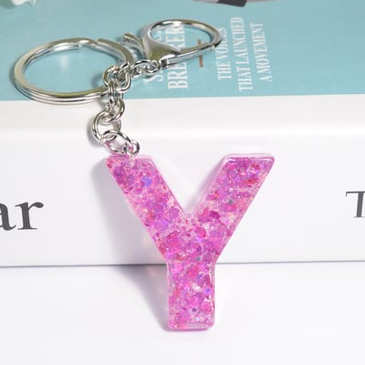 Sleutelhangers of voor je tas van A tot Z - met een pompon of kwastje - met letter - mooi design - handgemaakt - sleutelhangers - design - mode - goud - zwart - blauw - roze- rood