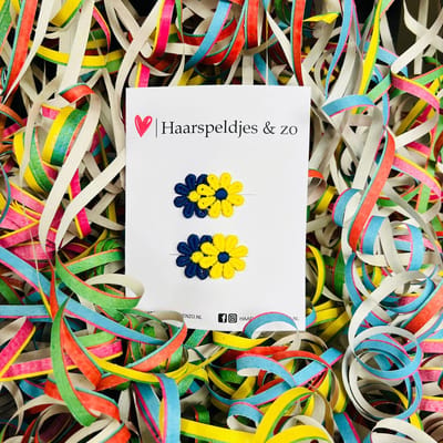 Antislip carnaval – blauw/geel (gele) madeliefjes op speldje – haaraccessoires – baby’s – meisjes