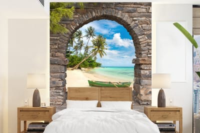 Behang - Fotobehang Strand - Palm - Doorkijk - Zee - Kano - Breedte 165 cm x hoogte 220 cm