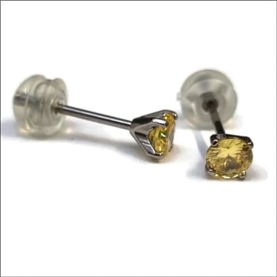 Aramat Jewels | Oorbellen | Ronde Titanium Oorbellen Geel 4mm met Zirkonia - Aramat | | | |4mm | Titanium | Kinderen, Volwassenen | Verkleurd niet