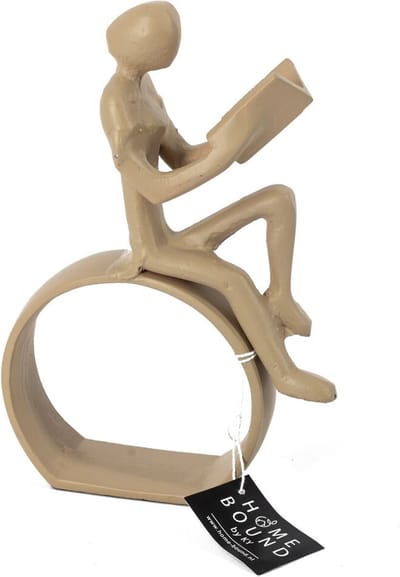 Beeld boek zittend beige