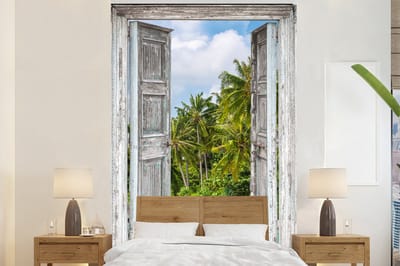 Behang - Fotobehang Palm - Zee - Doorkijk - Tropisch - Breedte 180 cm x hoogte 280 cm