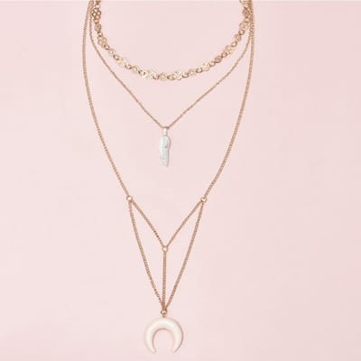 Fijne delicate ketting met halve maan en veer – 4-delig – Goudkleur