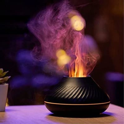 Aromatherapie diffuser en luchtbevochtiger met vlamactivering en 7 vlamkleuren (zwart).
