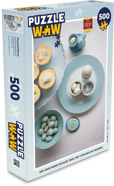 Puzzel Een voor Pasen gevulde tafel met cupcakes en snoepjes - Legpuzzel - Puzzel 500 stukjes