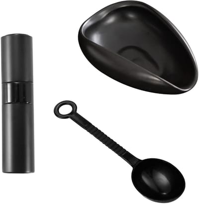 Keramische koffie-accessoires set voor koffiebonen, inclusief houder, spuitfles en lepel.