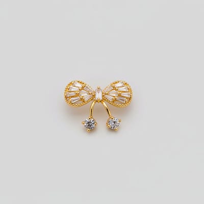 Gouden Strikbroche met Kristallen – Elegante Zilverkleurige Broche | Twinolo
