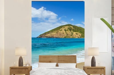 Behang - Fotobehang Zee - Tropisch - Strand - Planten - Breedte 200 cm x hoogte 300 cm