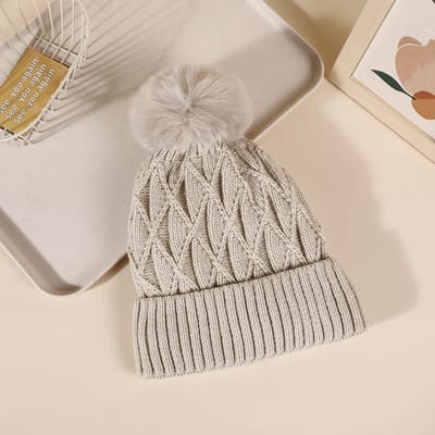 Chapeau d'hiver chaud en peluche épaisse tricotée pour femme avec pompon sans bords Chapeau tricoté polyvalent beige